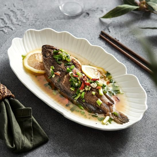 A New High-End Steamed Fish Dish for Home Use in 2025, Featuring a Trendy Oval Deep Ceramic Plate That Exudes a Light Luxury Feel